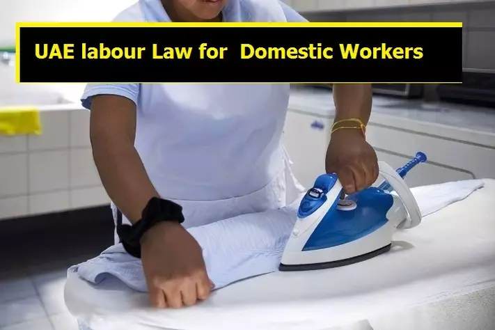 domestic worker in uae ironing on clothes