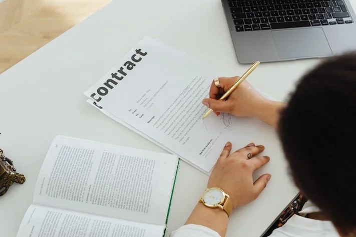 Employee in UAE Signing Labour Contract